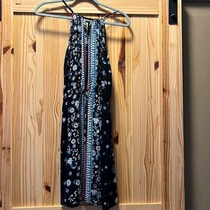 Black dress with orange, teal, and white pattern